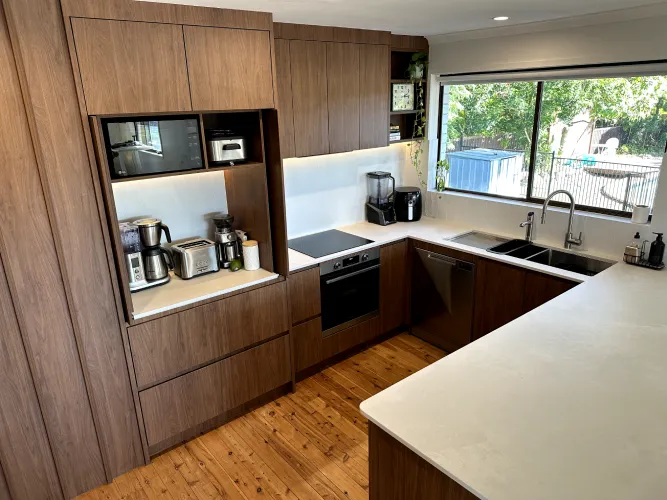 Kitchen renovation with brown timber cabinets